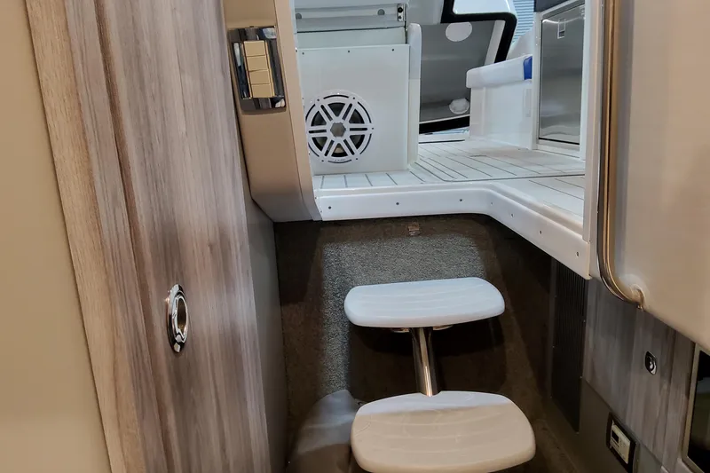 Slide: The Image of Interior view of 2027 Formula 330 Crossover Bowrider OB, featuring steps and modern design. - 84