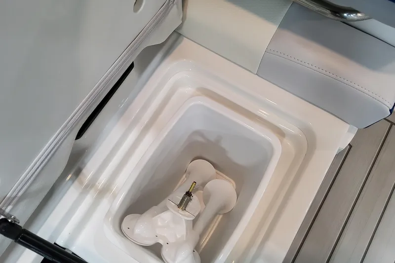 Slide: The Image of Storage compartment in 2027 Formula 330 Crossover Bowrider OB boat interior. - 93