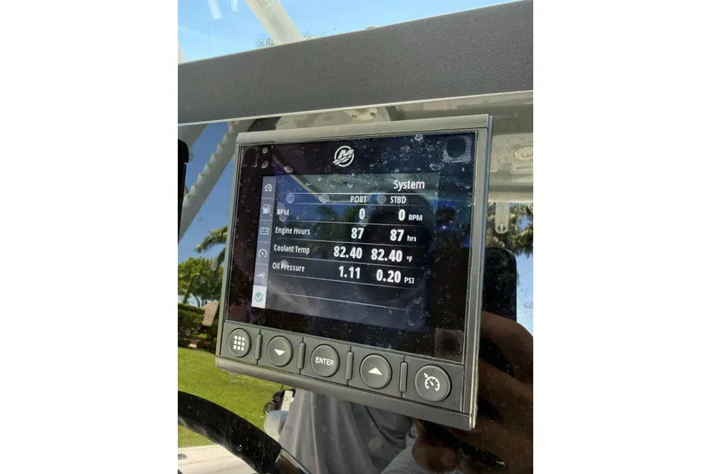 Slide: The Image of Display screen on 2022 Blackfin 252 CC showing engine metrics and system information. - 10