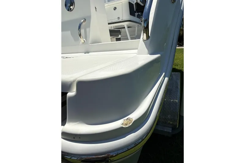 Slide: The Image of 2022 Blackfin 252 CC boat deck detail with stainless steel fixtures. - 37