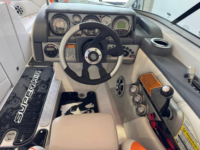 Slide: The Image of Interior view of 2008 Nautique Super Air Nautique 230 cockpit. - 26