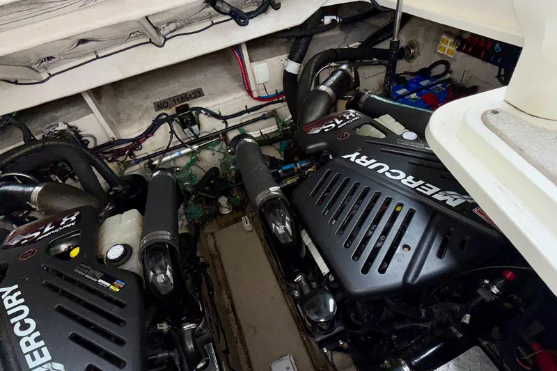 Slide: The Image of Engine room of 2006 Sea Ray 38 Sundancer with twin Mercury engines. - 37