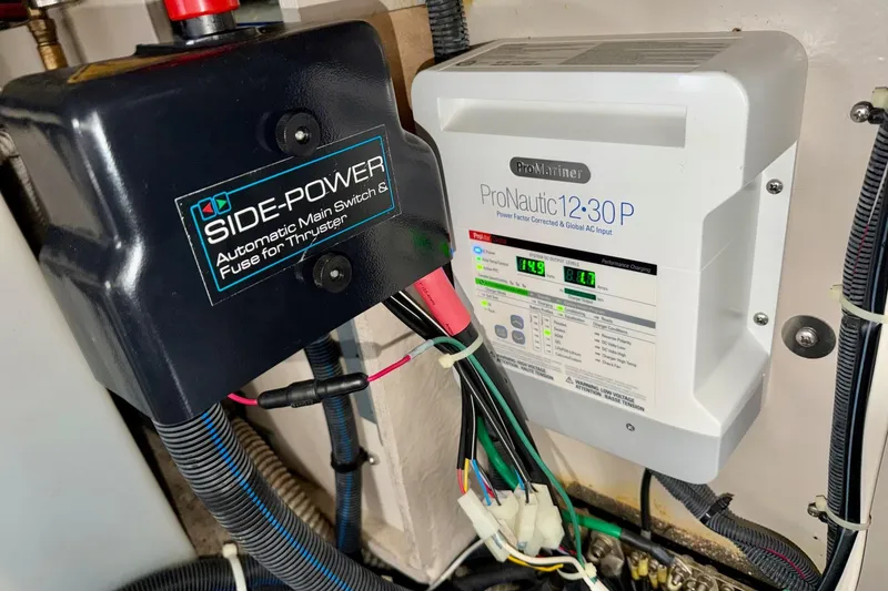 Slide: The Image of Side-Power thruster switch and ProMariner ProNautic charger on 2006 Sea Ray 38 Sundancer. - 40