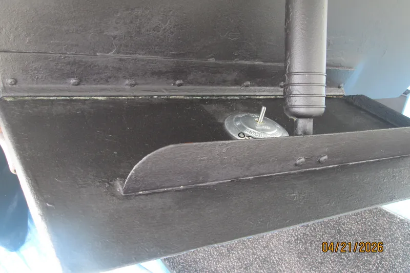 Slide: The Image of Close-up of a 2006 Sea Ray 38 Sundancer boat component, dated April 21, 2026. - 55