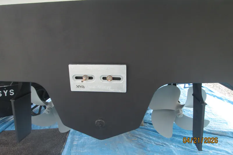 Slide: The Image of Rear view of 2006 Sea Ray 38 Sundancer boat propellers and hull detail. - 57