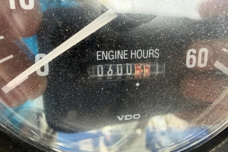 Slide: The Image of Close-up of engine hour meter showing 605.5 hours on a 1999 Silverton 352 Motor Yacht. - 18