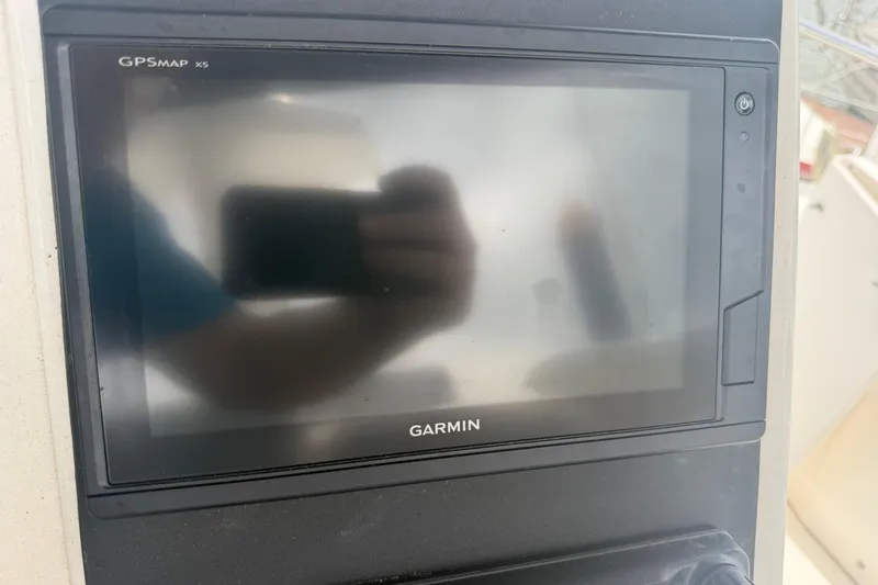 Slide: The Image of Garmin GPSMAP x5 on 1999 Silverton 352 Motor Yacht dashboard. - 19