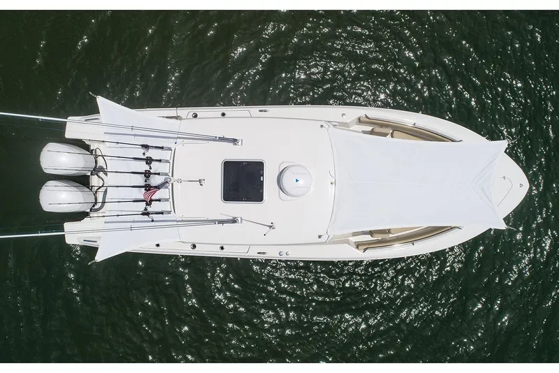 Slide: The Image of Manufacturer Provided Image: Aerial view of 2025 Pursuit S 288 Sport boat on water. - 7