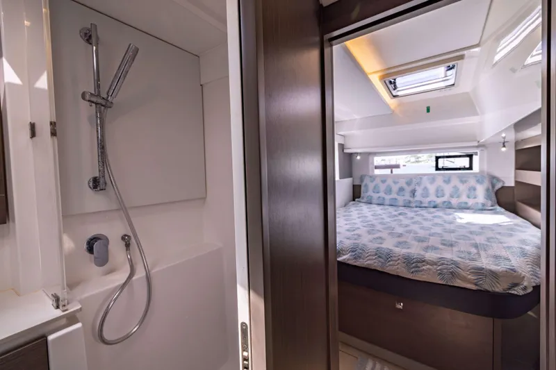 Slide: The Image of Luxurious interior of 2022 Leopard 42 yacht featuring a cozy bedroom and modern bathroom. - 48