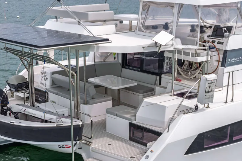 Slide: The Image of 2022 Leopard 42 catamaran with solar panels and spacious outdoor seating area. - 12
