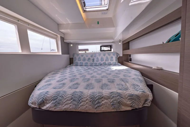 Slide: The Image of Luxurious bedroom interior of 2022 Leopard 42 yacht with skylight and modern design. - 49