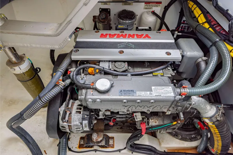 Slide: The Image of Engine compartment of a 2022 Leopard 42 yacht featuring a Yanmar engine. - 60