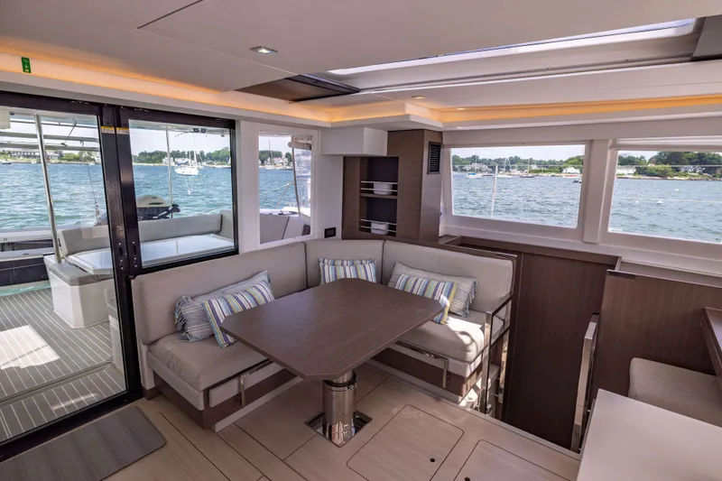 Slide: The Image of Luxurious interior of 2022 Leopard 42 yacht with waterfront view and modern seating area. - 32