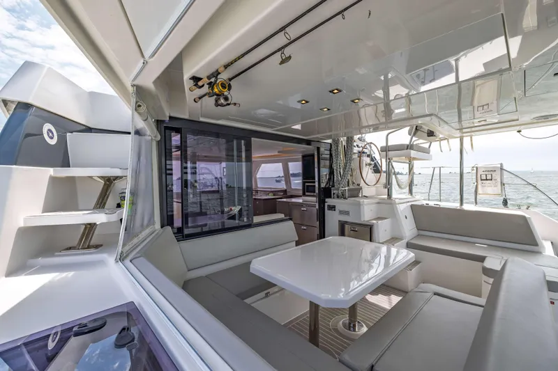 Slide: The Image of Luxurious 2022 Leopard 42 yacht interior with modern seating and ocean view. - 26