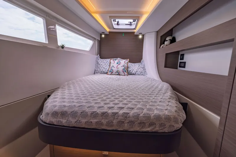 Slide: The Image of Luxurious cabin interior of 2022 Leopard 42 yacht with cozy bedding and modern design. - 43
