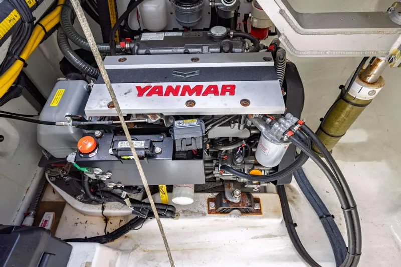 Slide: The Image of Engine compartment of a 2022 Leopard 42 yacht featuring a Yanmar engine. - 58