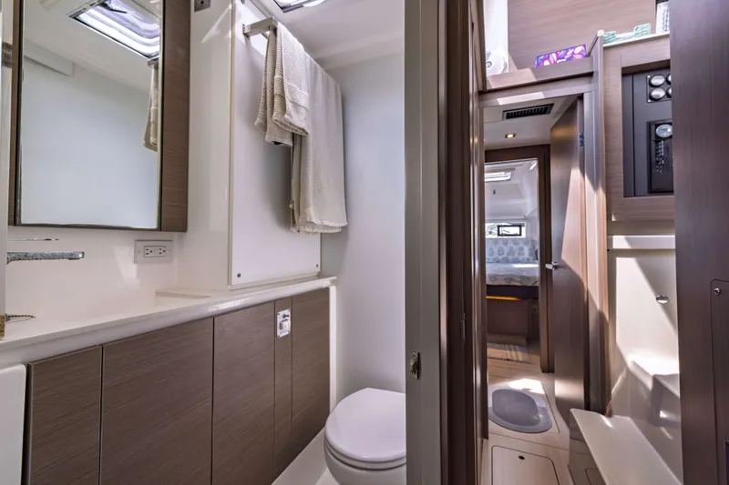 Slide: The Image of Modern bathroom interior on a 2022 Leopard 42 yacht, featuring sleek design and ample lighting. - 55