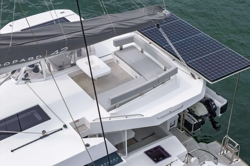 Slide: The Image of Modern Leopard 42 catamaran with solar panels, spacious deck, and sleek design, 2022 model. - 10