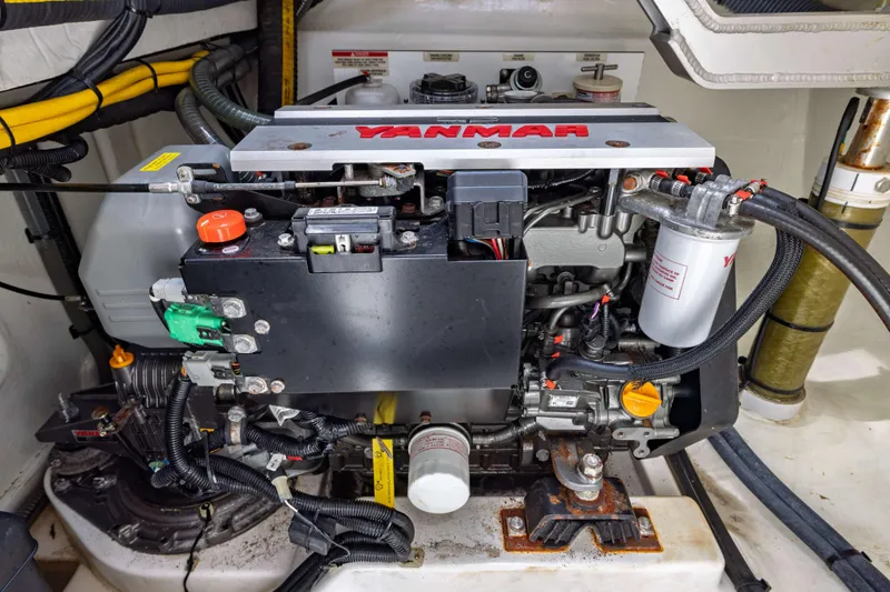 Slide: The Image of Engine compartment of a 2022 Leopard 42 yacht featuring a Yanmar engine. - 59