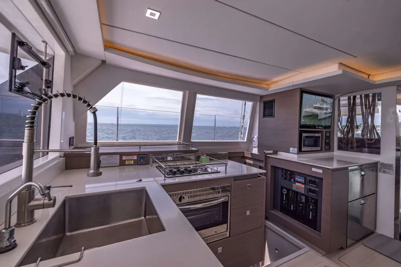 Slide: The Image of Modern kitchen interior on 2022 Leopard 42 yacht with ocean view. - 38
