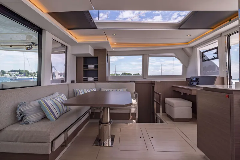 Slide: The Image of Luxurious interior of 2022 Leopard 42 yacht with modern seating and panoramic windows. - 35