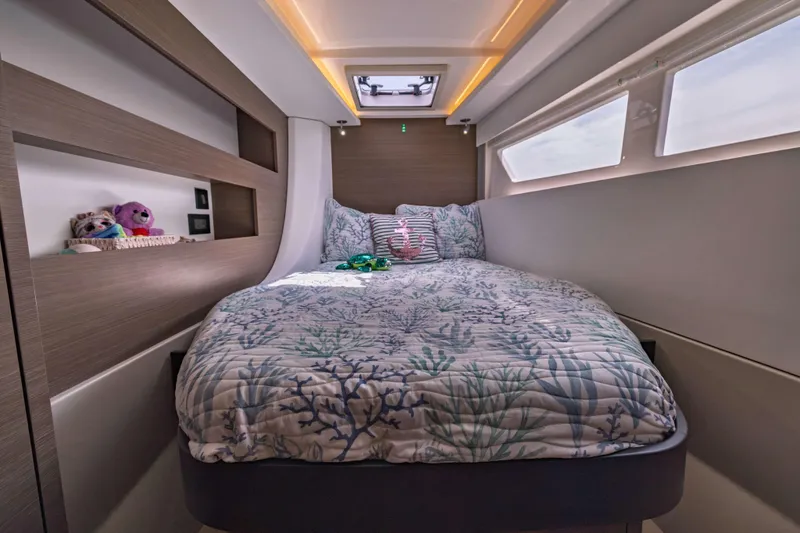 Slide: The Image of Luxurious cabin interior of 2022 Leopard 42 yacht with cozy bed and plush decor. - 53