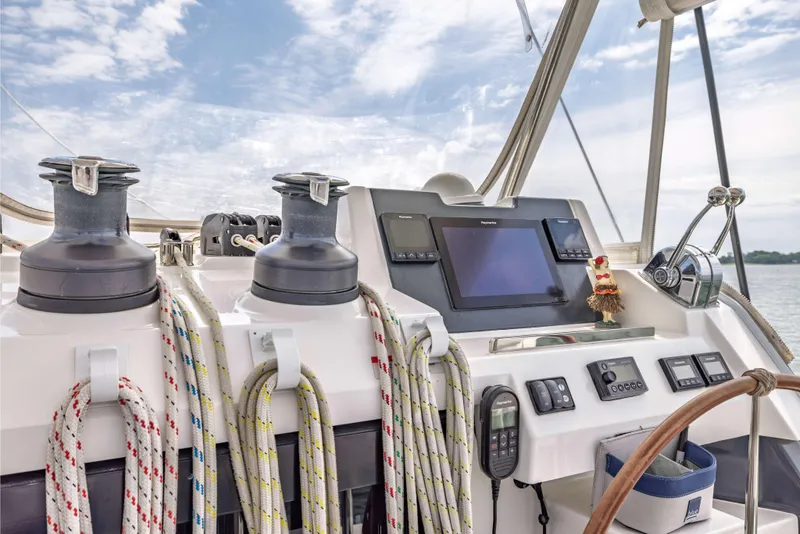 Slide: The Image of Cockpit of 2022 Leopard 42 sailboat with navigation equipment and ropes. - 18