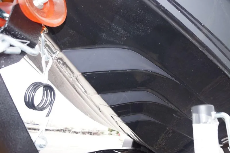 Slide: The Image of Close-up of the 2026 Phoenix 819 ZXL boat hull design. - 12