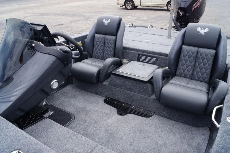 Slide: The Image of Interior of a 2026 Phoenix 819 ZXL boat with luxurious seating and modern dashboard. - 13