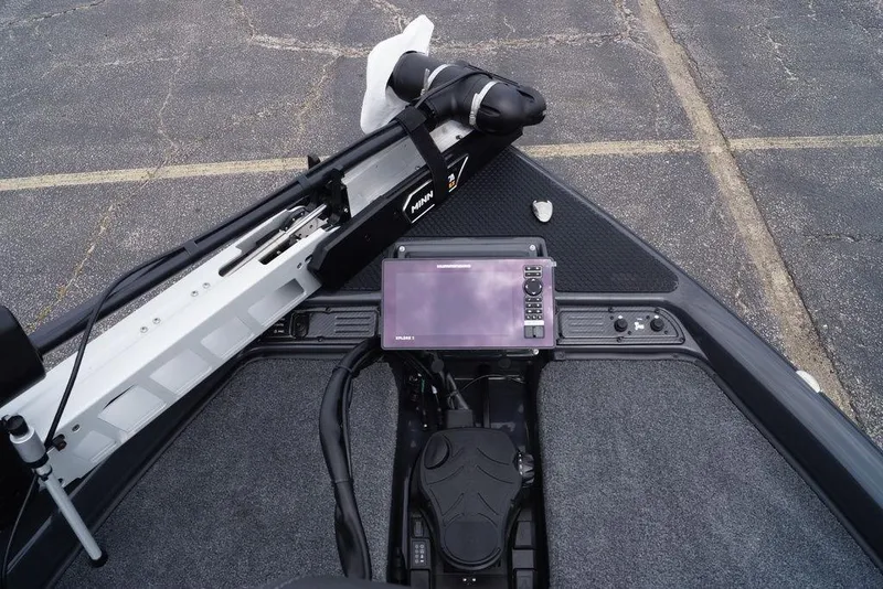 Slide: The Image of 2026 Phoenix 819 ZXL boat dashboard with advanced navigation system and controls. - 15