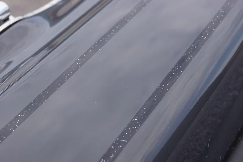 Slide: The Image of Close-up of 2026 Phoenix 819 ZXL car hood with metallic finish and subtle speckled detailing. - 3