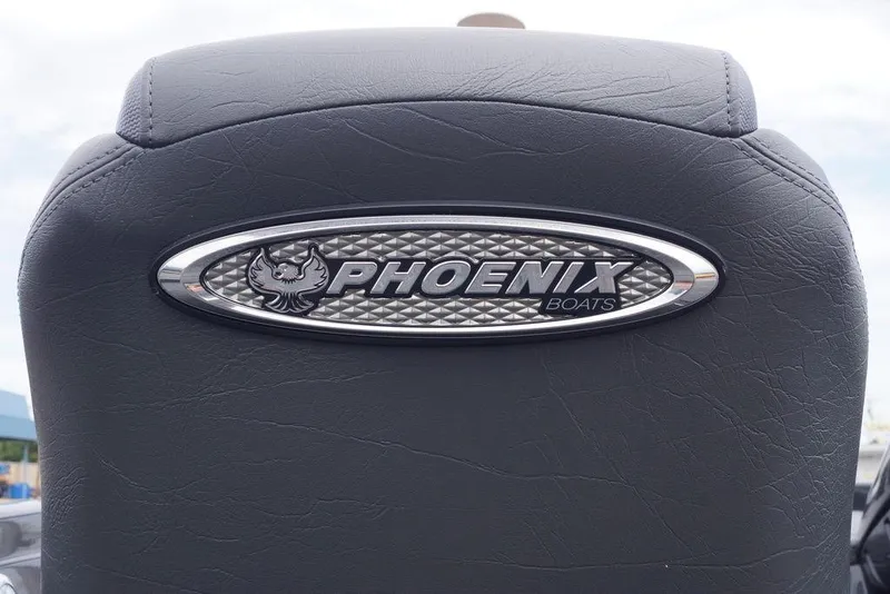 Slide: The Image of Phoenix 819 ZXL 2026 boat seat with embossed logo, showcasing luxury design. - 7