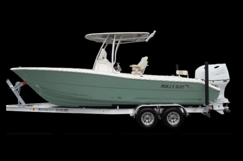 The Image of 2027 Bulls Bay 255 Center Console boat on trailer, side view, black background. - 0