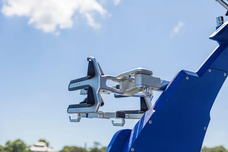Slide: The Image of Close-up of a 2017 Malibu M235 boat accessory against a clear blue sky. - 43
