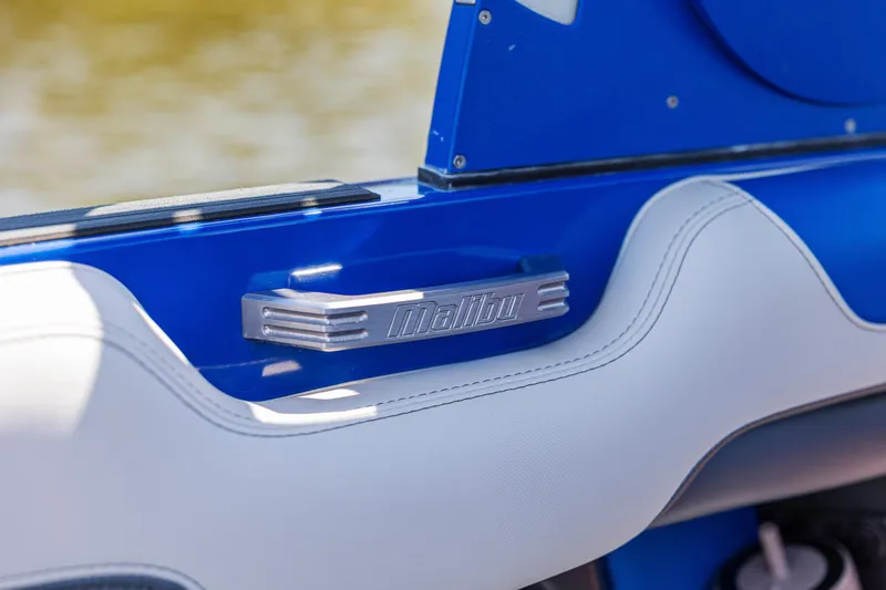 Slide: The Image of Interior detail of 2017 Malibu M235 boat with blue and white upholstery. - 45