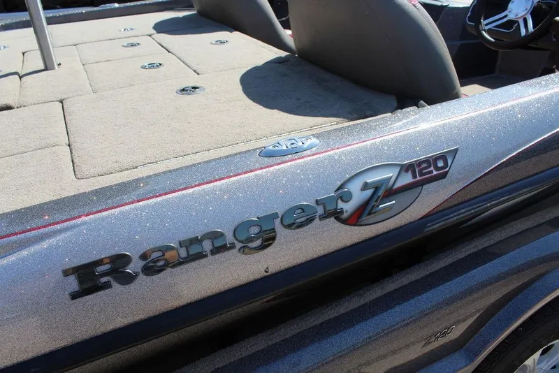 Slide: The Image of 2011 Ranger Z120 Comanche boat with sleek design and spacious deck. - 11