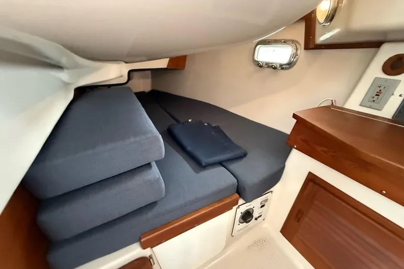 Slide: The Image of Cozy cabin interior of 1999 Seaward Eagle 32 yacht by Hake Yachts Inc. - 32