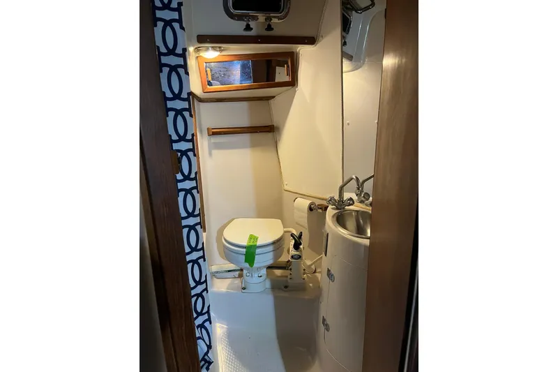 Slide: The Image of Compact bathroom in 1999 Seaward Eagle 32 yacht by Hake Yachts Inc. - 38
