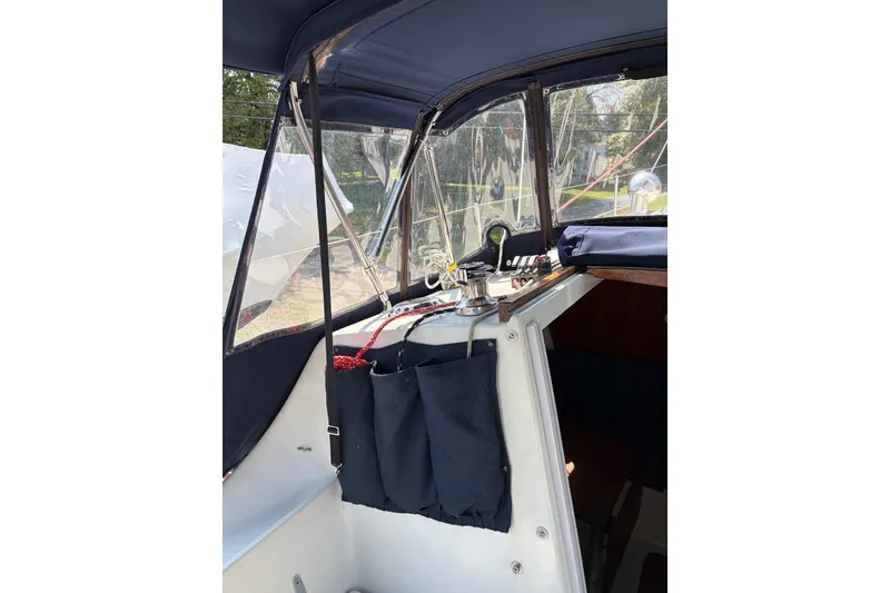 Slide: The Image of Cockpit view of 1999 Seaward Eagle 32 sailboat by Hake Yachts Inc, featuring navigation equipment. - 6