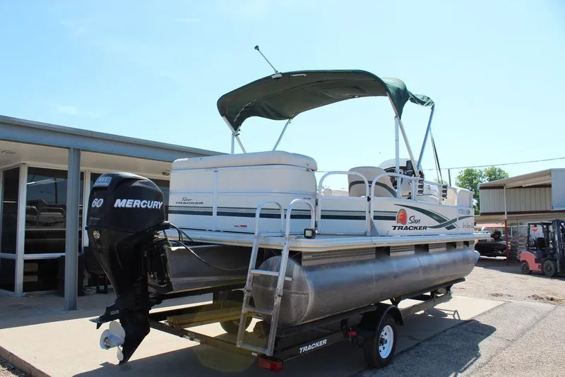 Slide: The Image of 2011 Sun Tracker Party Barge 20 Regency Edition pontoon boat with Mercury engine on trailer. - 4