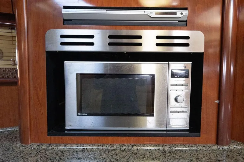 Slide: The Image of Built-in microwave in 2005 Sea Ray 420 Sundancer yacht kitchen. - 35
