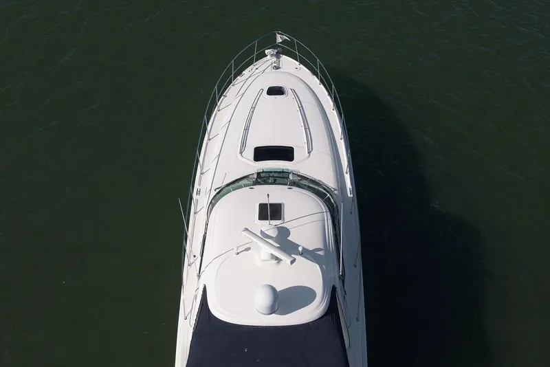 Slide: The Image of Top view of a 2005 Sea Ray 420 Sundancer yacht on water. - 4