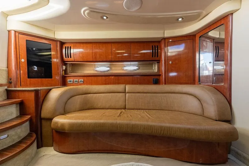 Slide: The Image of Luxurious interior of a 2005 Sea Ray 420 Sundancer yacht with elegant wood finishes. - 41
