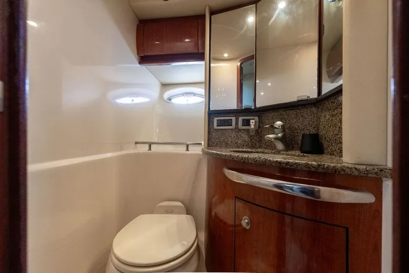 Slide: The Image of Luxurious bathroom in 2005 Sea Ray 420 Sundancer yacht with modern fixtures. - 48