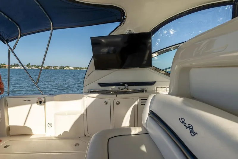Slide: The Image of Interior view of 2005 Sea Ray 420 Sundancer yacht with TV and seating. - 62