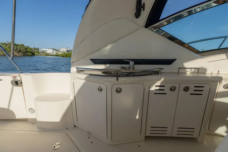 Slide: The Image of Interior view of 2005 Sea Ray 420 Sundancer yacht with sink and cabinets. - 71