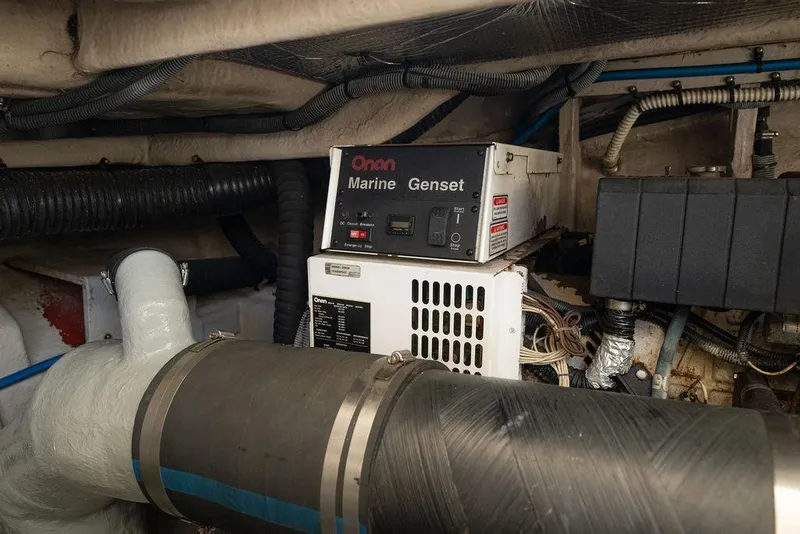 Slide: The Image of Engine room of 2005 Sea Ray 420 Sundancer with Onan Marine Genset. - 75