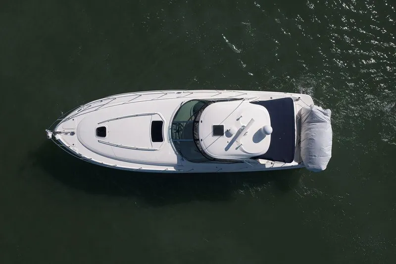 Slide: The Image of Aerial view of 2005 Sea Ray 420 Sundancer yacht cruising on water. - 9