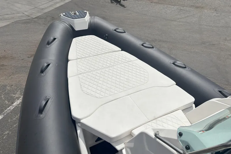 Slide: The Image of 2026 Zodiac Medline 7.5 GT boat with cushioned seating and sleek design. - 10