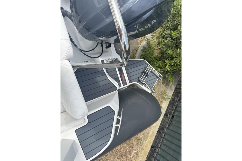 Slide: The Image of Zodiac Medline 7.5 GT 2026 boat interior with Yamaha engine and sleek seating. - 14